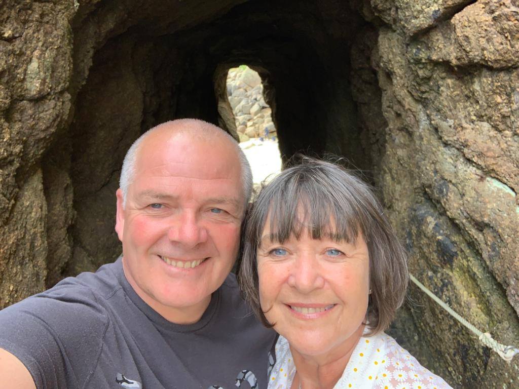 Husband and wife selfie in a cave