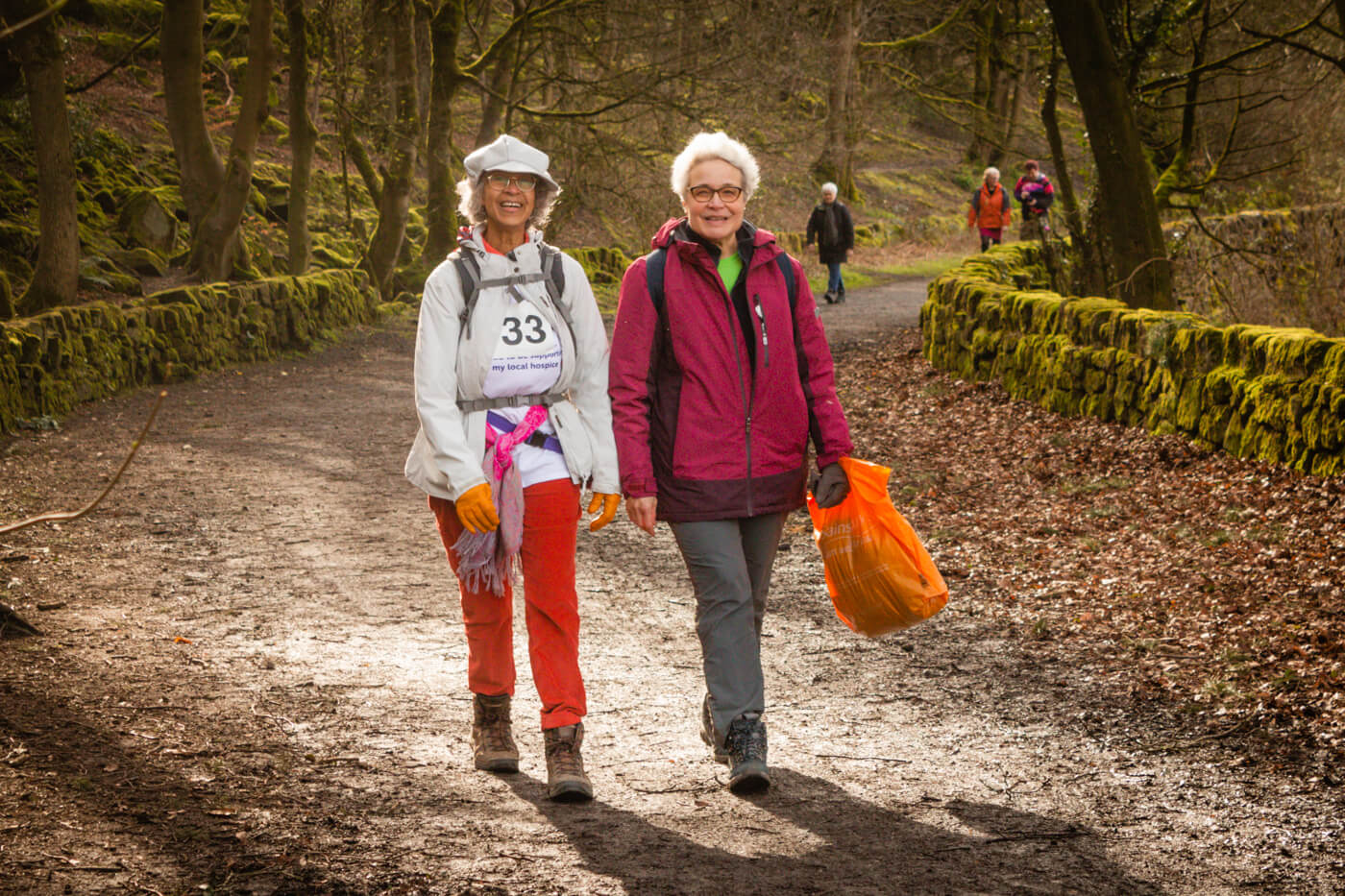 Two people walking on the High Peak Trail