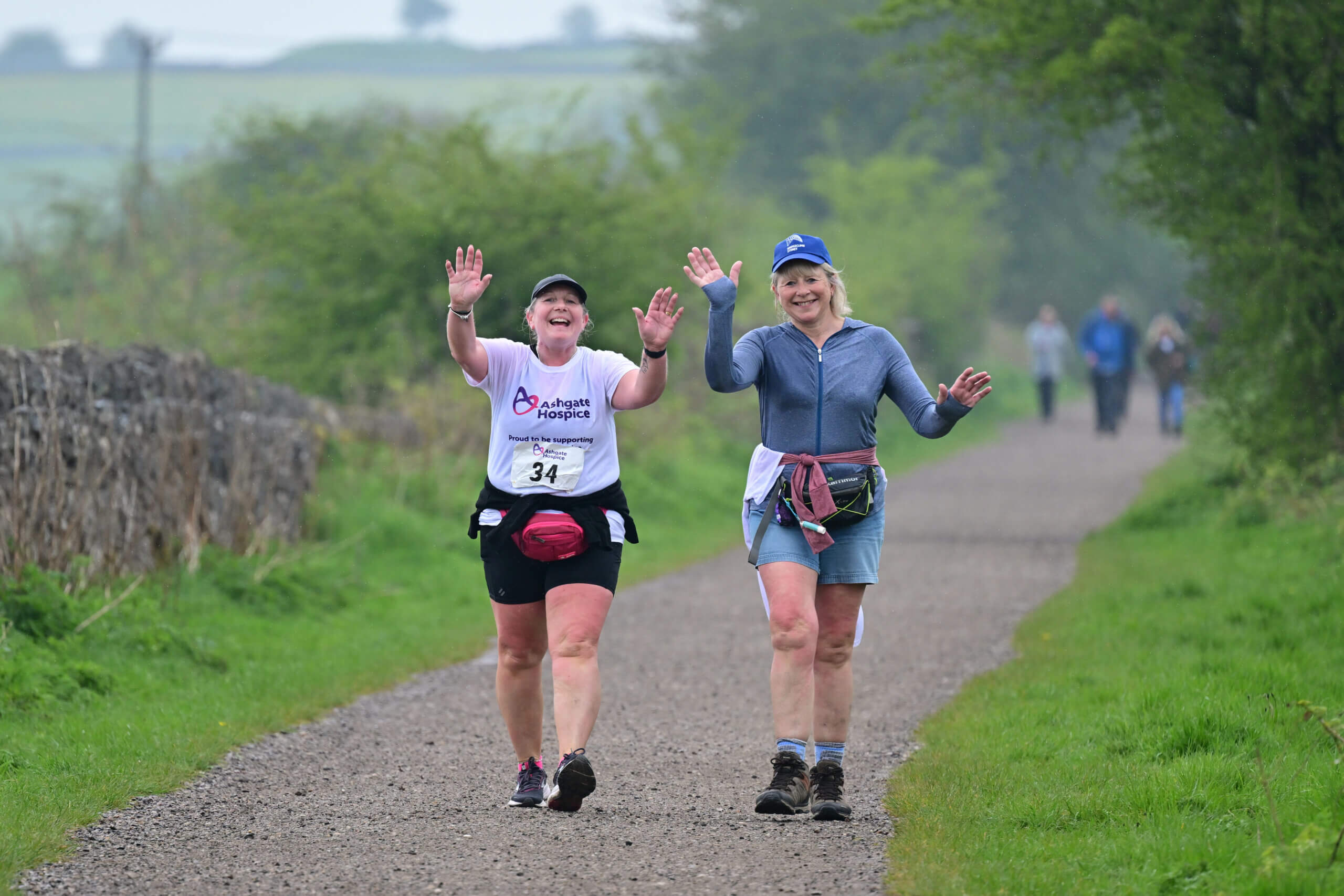 Two women walk the High Peak Trail