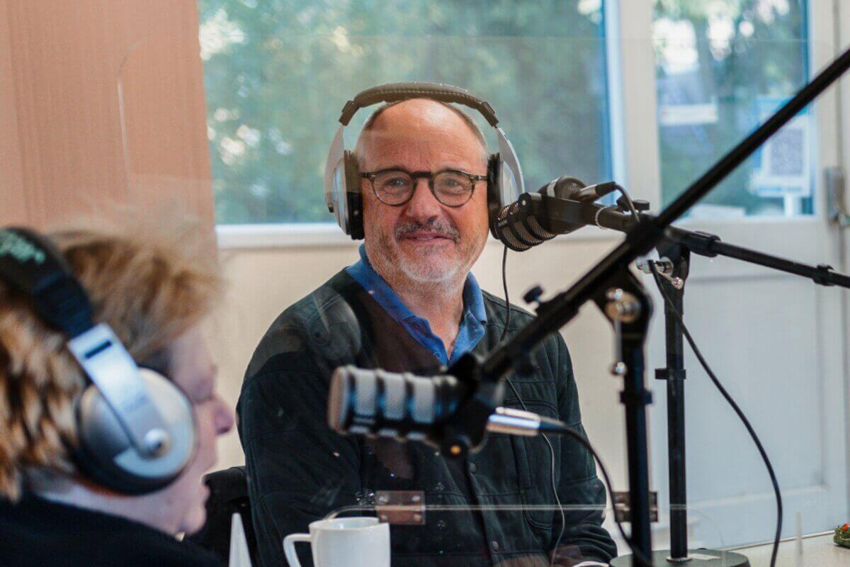 Stephen Rumford, host of The Life and Death Podcast, recording a podcast episode.