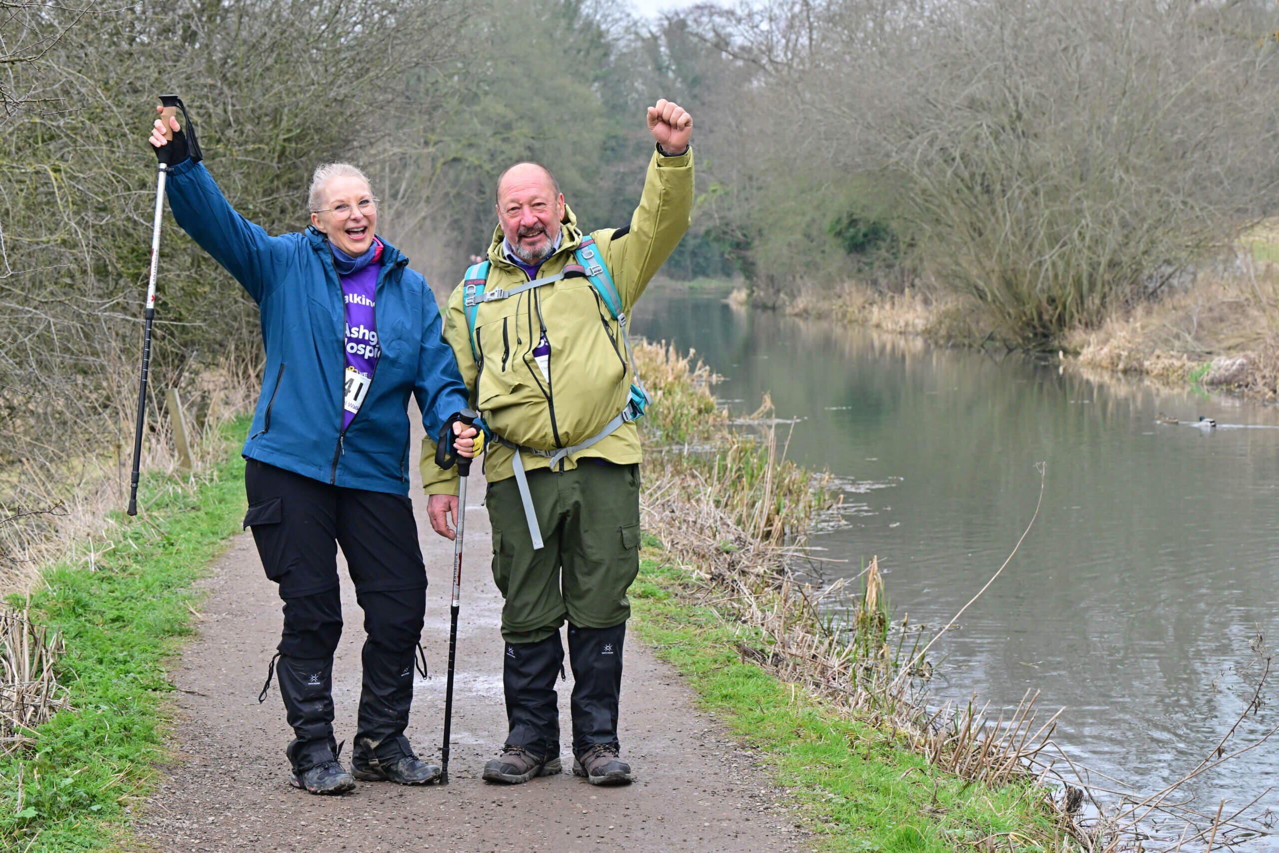 Two people on the High Peak Trail Walk punching the air.