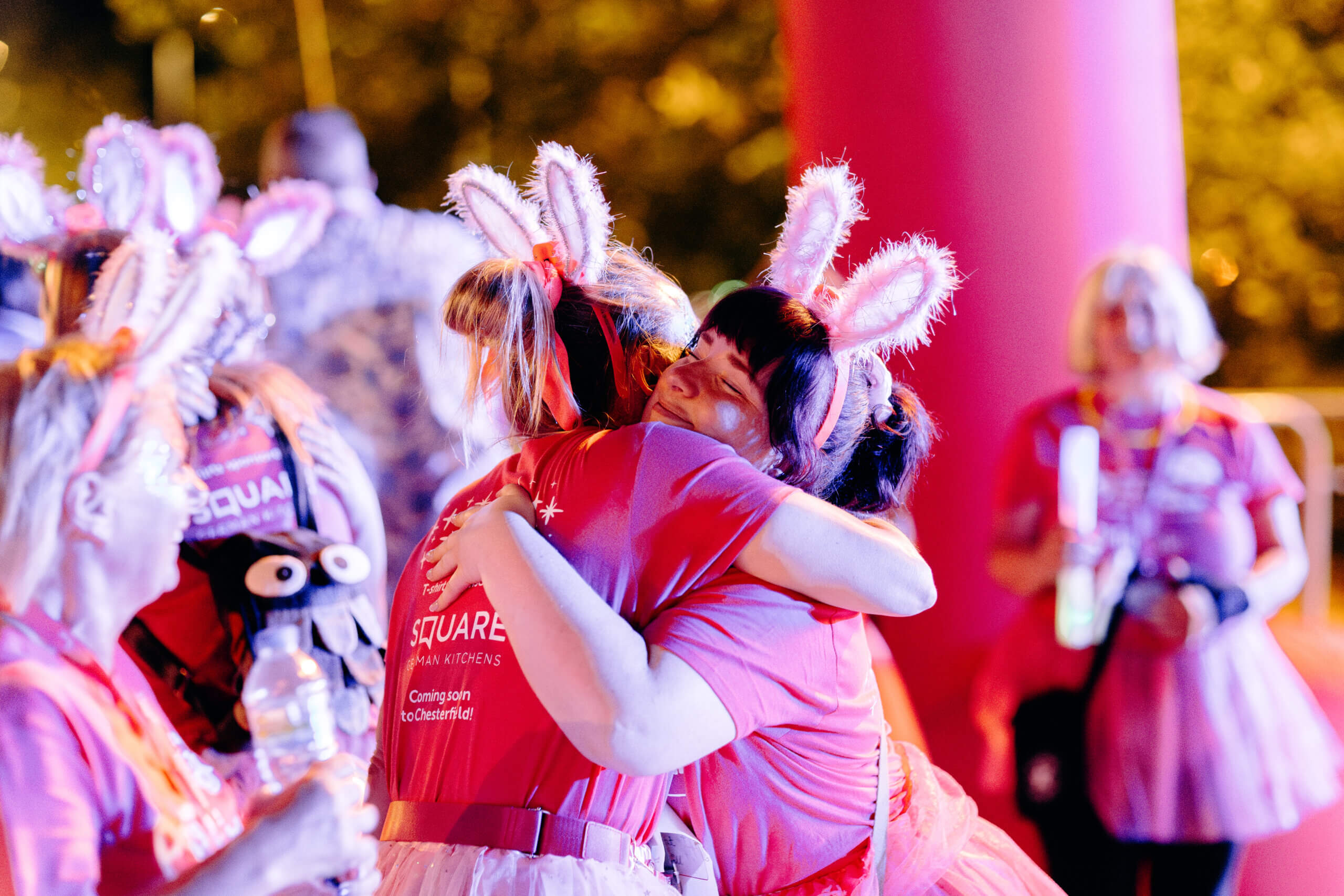 Two people hugging. Photo by EKR Pictures.