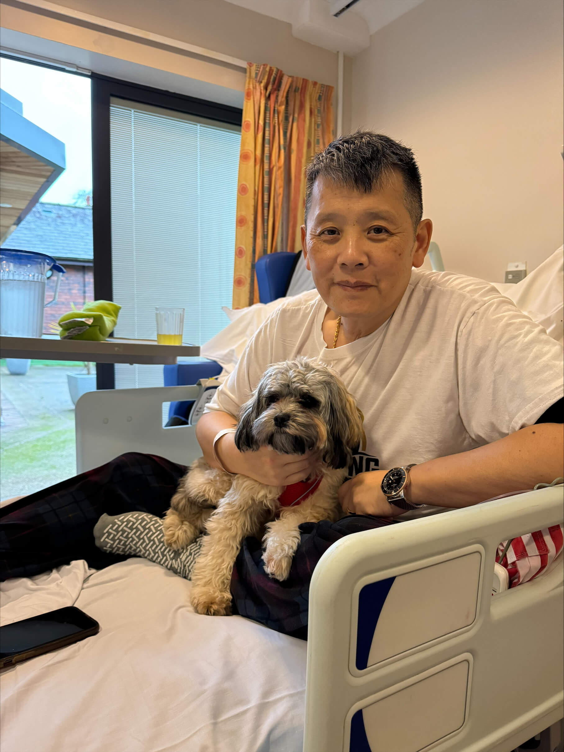 Lung Li and Bethany's dog at Ashgate Hospice